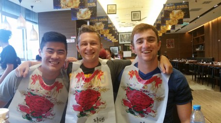 Brandon Cheung, Jacob Lokshing, and Rowan McEvoy enjoy dinner.