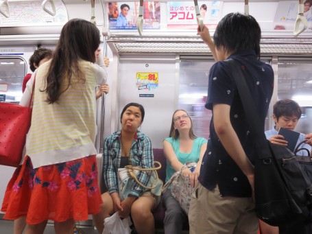 USC students talking with Meiji students on the train.