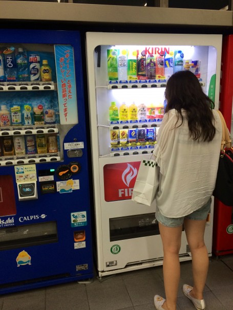 Janet using the ever-convenient vending machines in Kyoto.