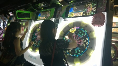 A Rhythm game being played by Lisa and Sarah