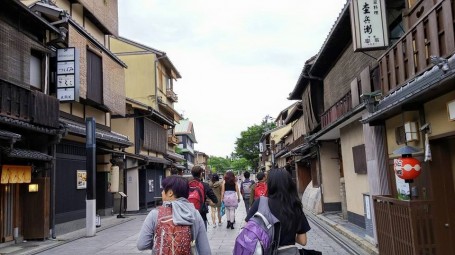 exploring the bustling streets of Kyoto