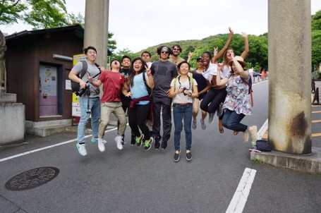 Jumping in front of Kannon statue  