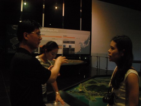 Our professor and Lucy discussing some aspects of the building plans of IFEZ. Hyunji looks on in the background.