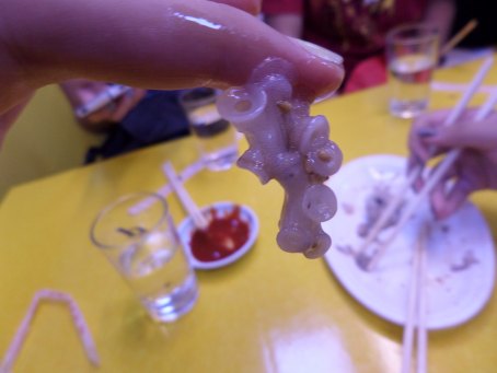 Live octopus, the tentacles would still move and stick to the inside of your mouth while eating them