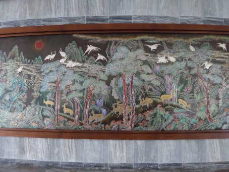 Mother of pearl paiting that took months for 6 artists to complete, the cranes represent the 20 presidents from different countries who visited this building