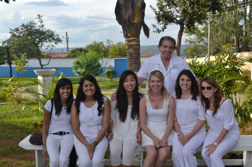   John of God pictured with some of the PWP group in a garden at the Casa. PC: Amita Risbud. 