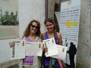 The author with her daughter Marika showing off the Compostelas in 2015.