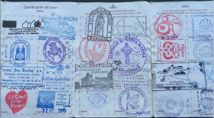 A pilgrim passport with stamps from along the Way